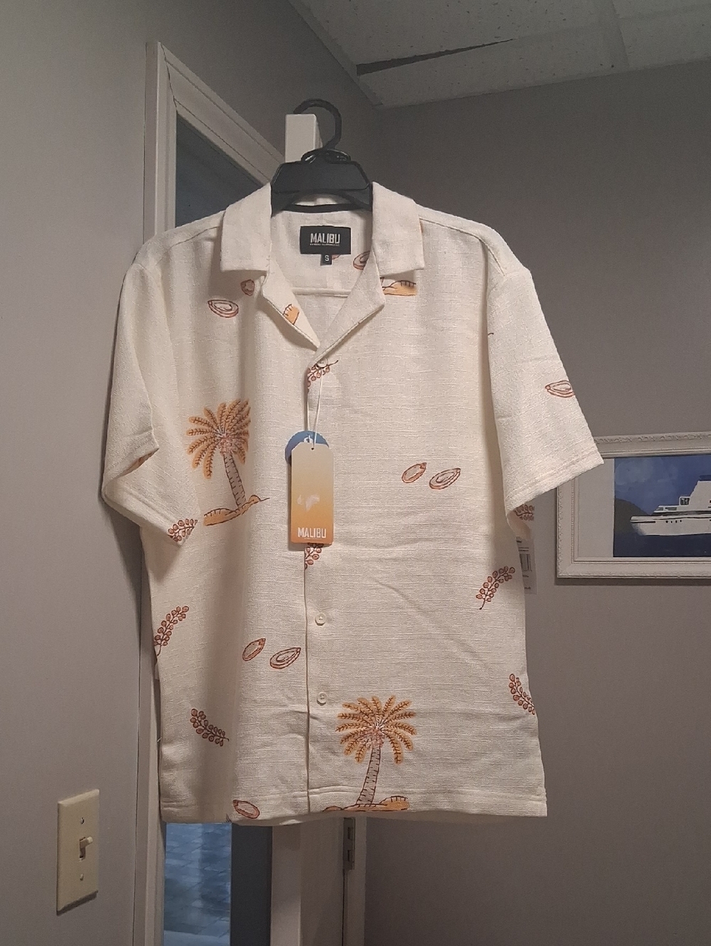 Malibu Cream Short-Sleeve Button-Down And Shorts Set with Brown Palm Motif.